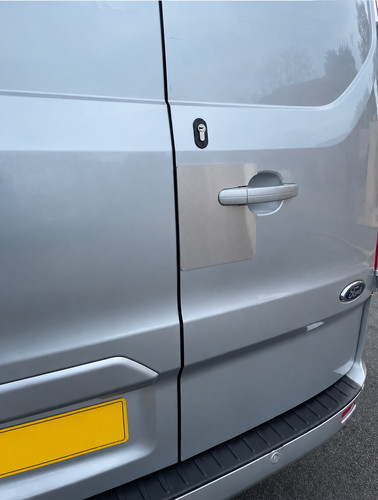 Rear door latch shield - rear,
